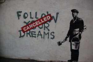 "Follow your dreams" street artwork from Banksy.
